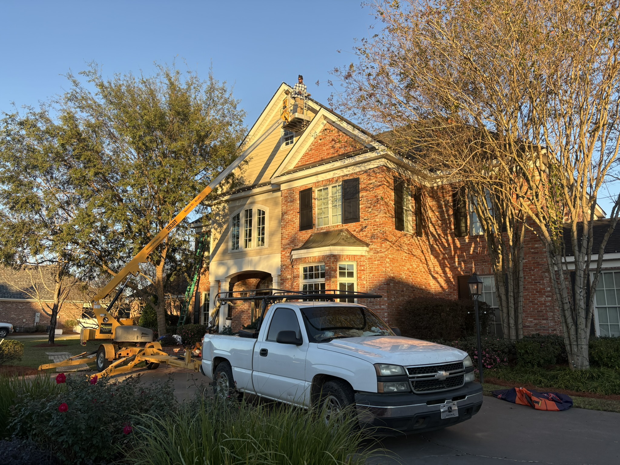 Christmas light installation in progress