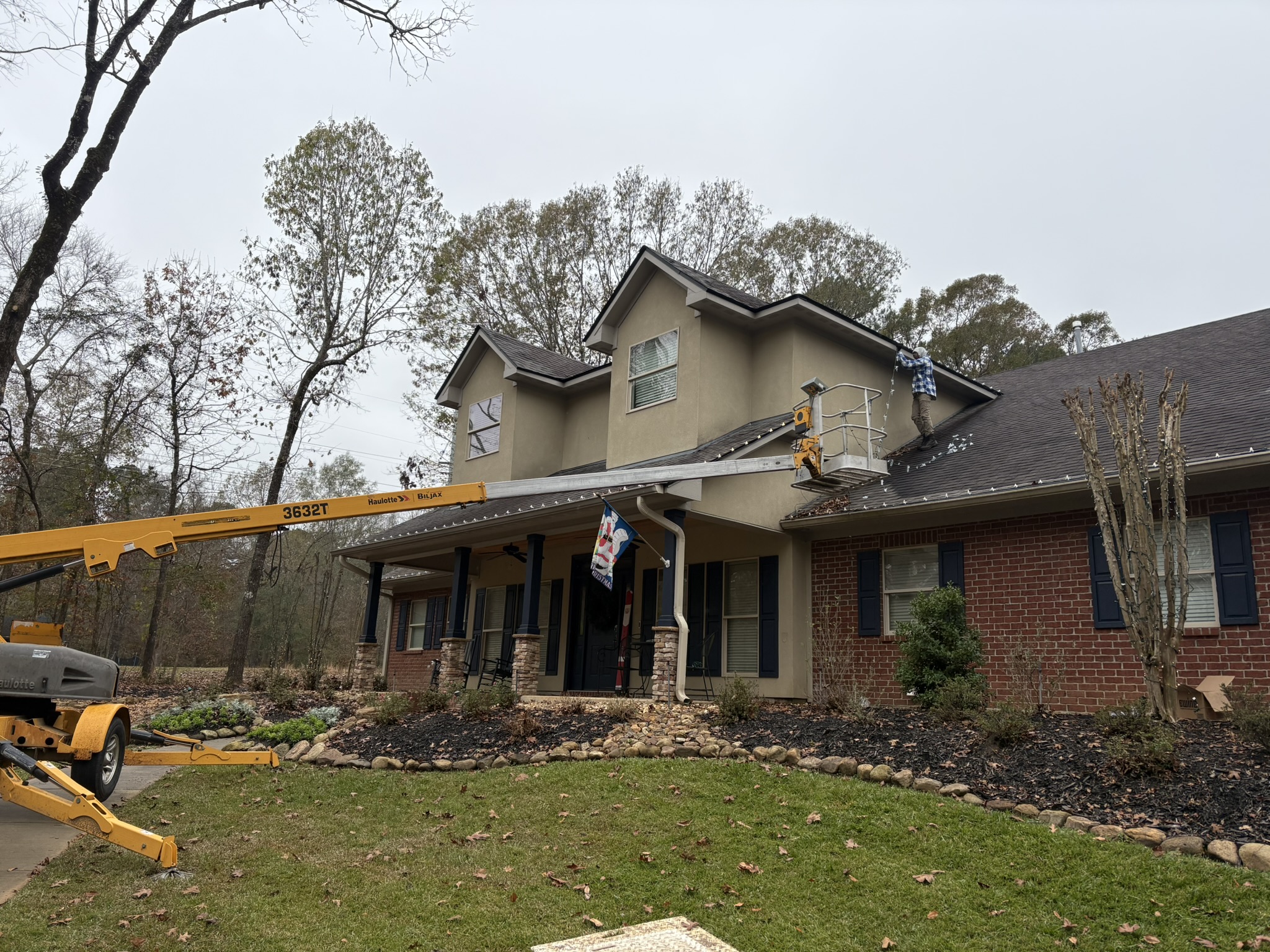 Christmas light installation in progress